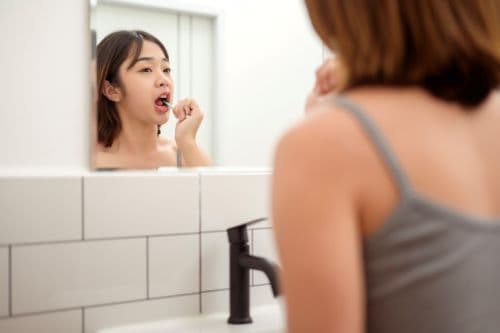 Chronic Bad Breath: Five Major Causes Beyond "Heatiness," Self-Checks, and When to See a Dentist