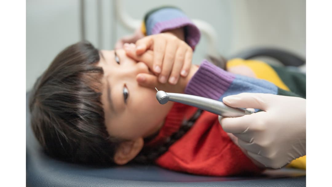 A nervous young patient: our paediatric team uses gentle, step-by-step guidance